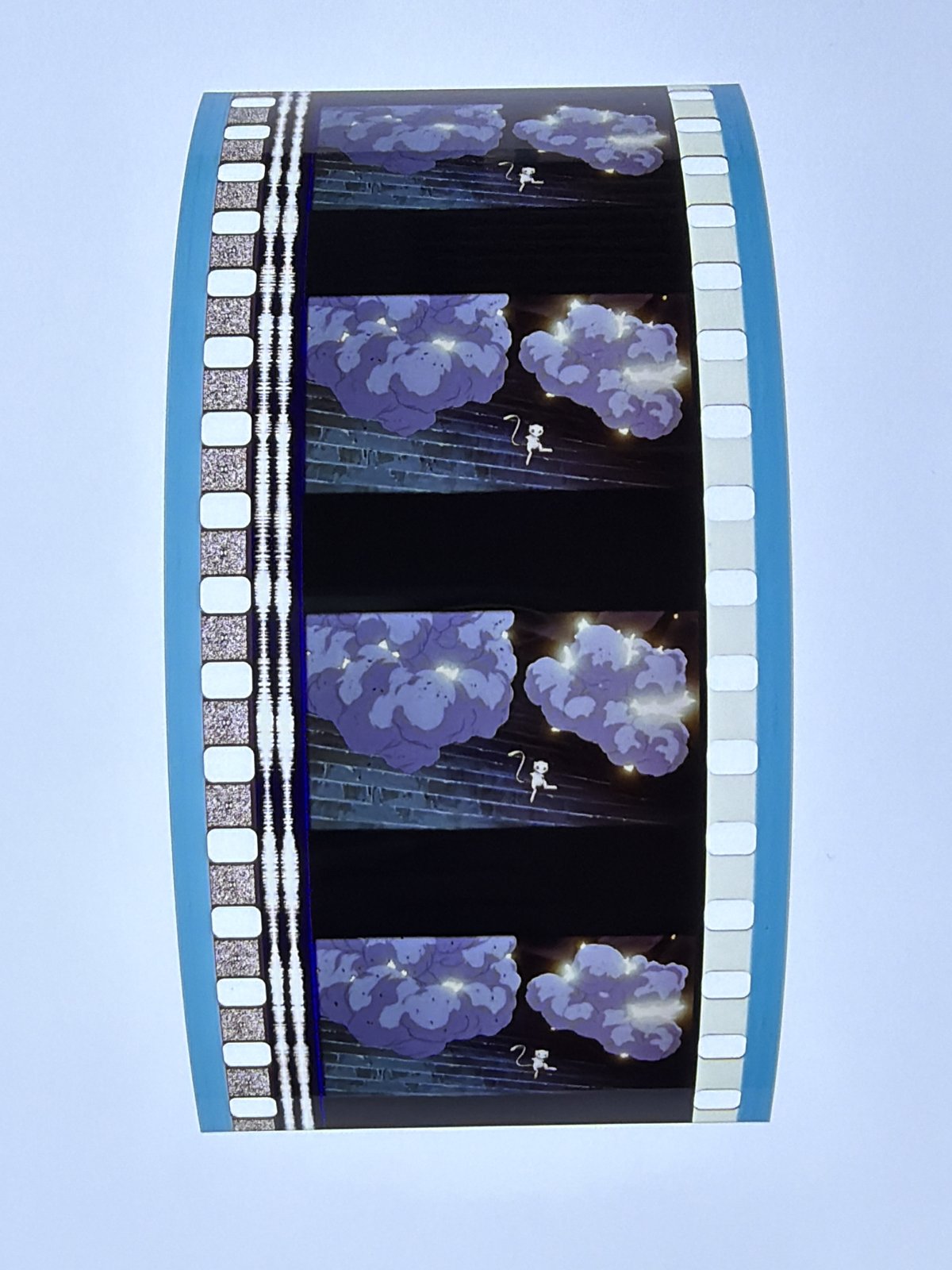 The film strip as photographed on the light panel at intake, before encapsulation
