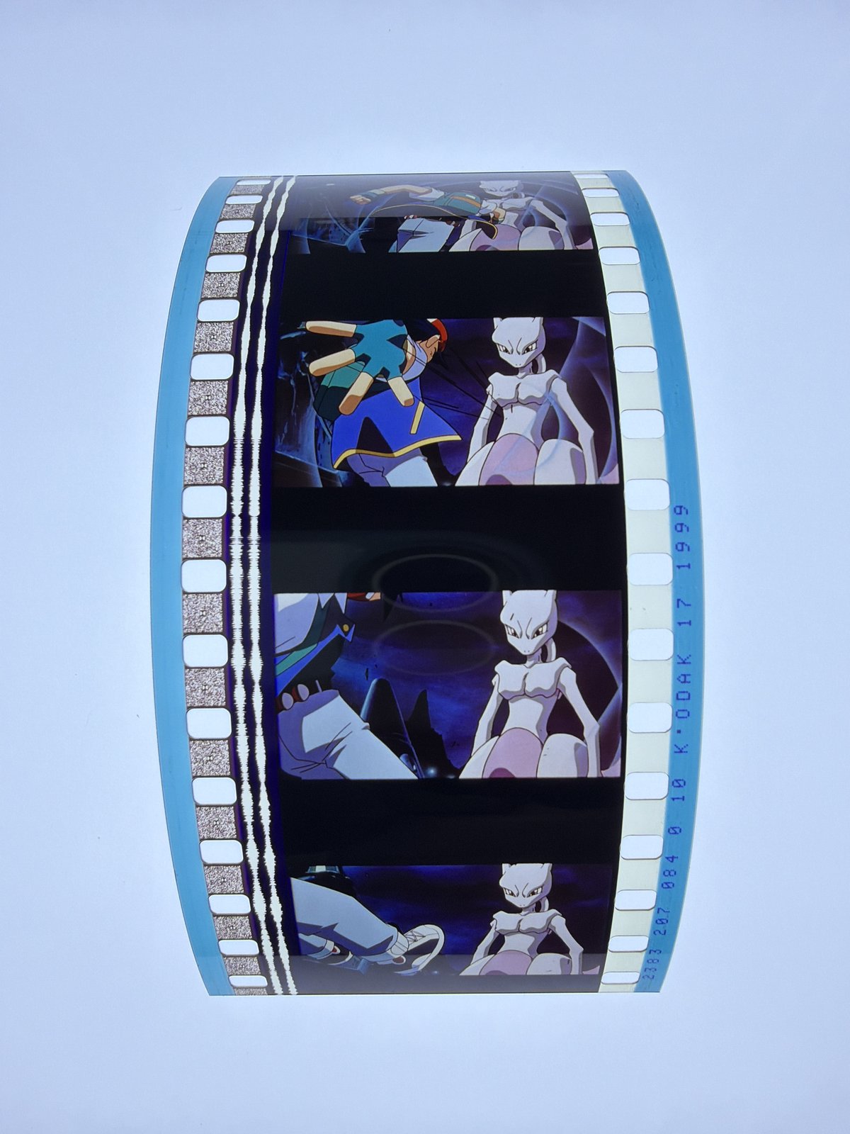 The film strip as photographed on the light panel at intake, before encapsulation