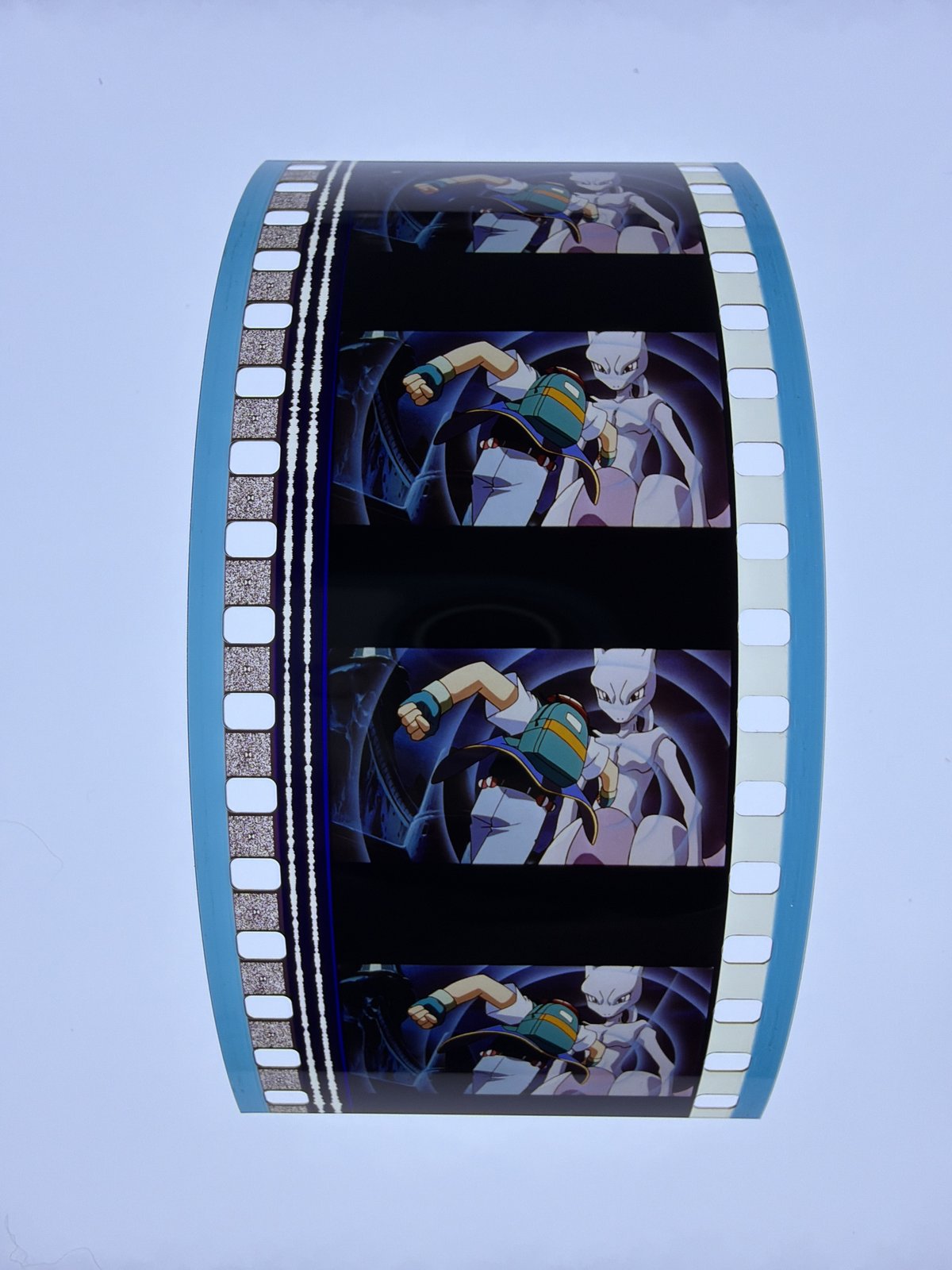 The film strip as photographed on the light panel at intake, before encapsulation