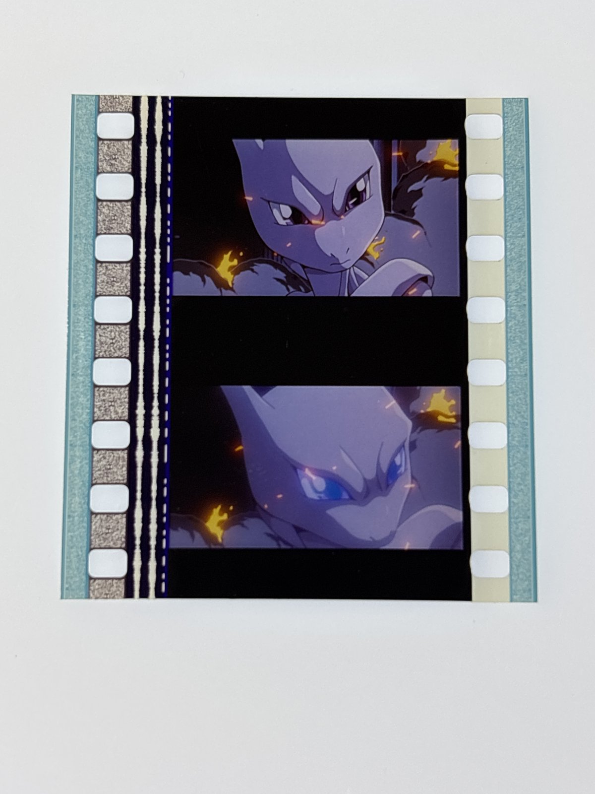 The film strip as photographed on the light panel at intake, before encapsulation